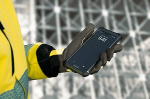 Worker-with-Xshielder-in-hand-1